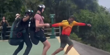 Instrutor de parapente cai em área de mata durante salto em Niterói. Equipes de resgate foram acionadas e prestaram atendimento.